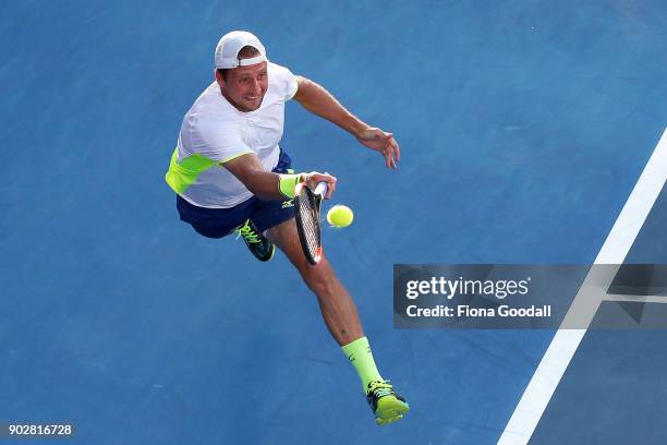 Tennys Sandgren of USA plays a forehand in his first round match against Hyeon Chung of Korea during day two of the ASB Men's Classic at ASB Tennis...
