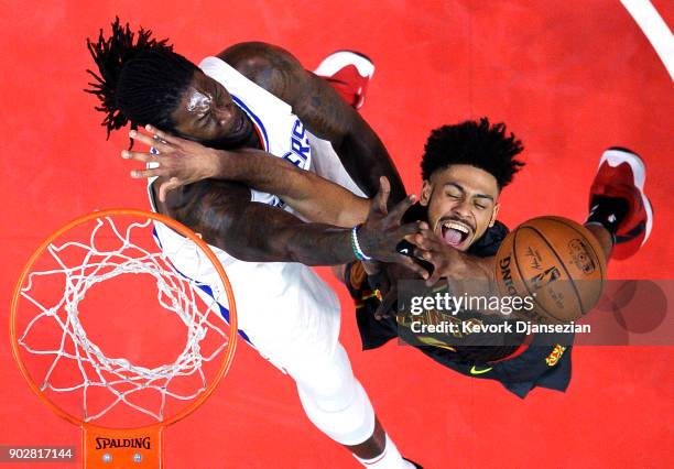 Tyler Dorsey of the Atlanta Hawks has a layup blocked by Montrezl Harrell of the Los Angeles Clippers during the second half of basketball game at...