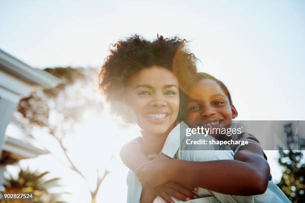 she won't let go even if she tried - african ethnicity lifestyle africa stock pictures, royalty-free photos & images