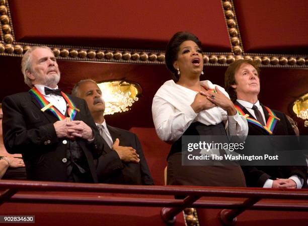 Merle Haggard, Oprah Winfrey and Paul McCartney sing the national anthem at the Annual Kennedy Center Honors Gala in Washington, DC on December 5,...