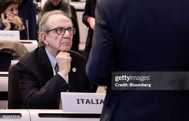 Pier Carlo Padoan, Italy's finance minister, looks on whilst sat in the audience during the European Commission's financial framework conference in...