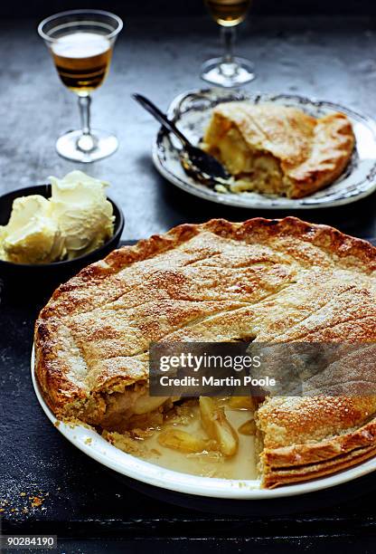 apple pie on table in kitchen - apple pie stock pictures, royalty-free photos & images