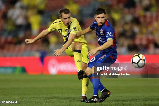 Wout Brama of the Mariners contests the ball against Wayne Brown of the Jets during the round 15 A-League match between the Newcastle Jets and the...