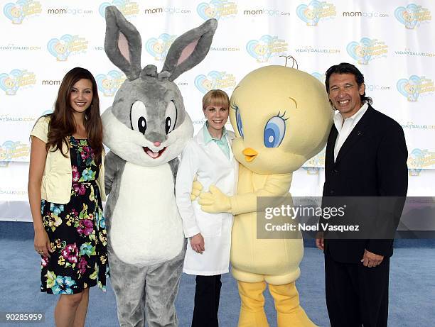 Hostess Argelia Atilano, Dra. Aliza, and senior vice president & general manager for WBCP Latin American Jeff Whalen attend the baby looney tunes and...