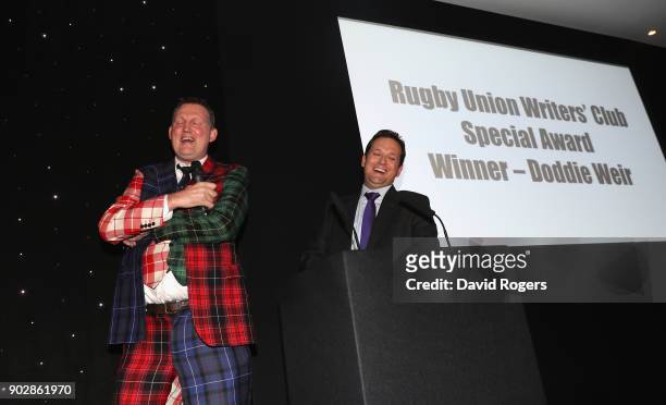 Doddie Weir, the former Scotland international and Newcastle Falcons player, talks with Alastair Eykyn, the RUWC master of ceremonies during the...