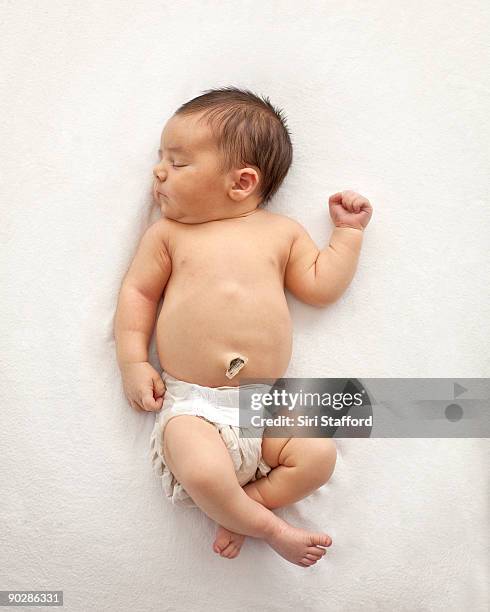 infant baby boy asleep - supino foto e immagini stock