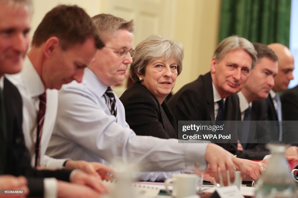 The British Prime Minister Poses With Her Reshuffled Cabinet