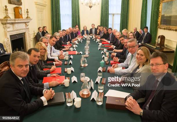 British Prime Minister Theresa May leads her first cabinet meeting of the new year following a reshuffle at 10 Downing Street on January 9, 2018. In...