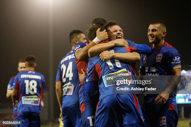 Patricio Rodriguez of the Jets celebrates his goal with team mates during the round 15 A-League match between the Newcastle Jets and the Central...