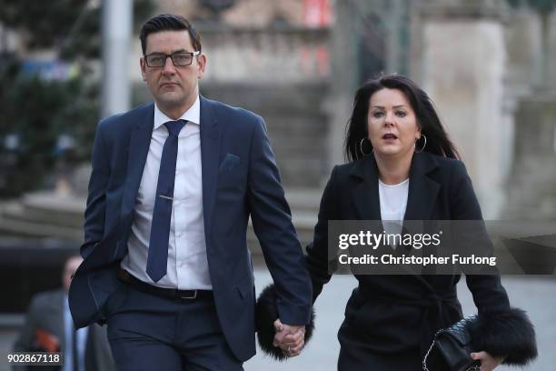 Former footballer Andy Woodward and partner Zelda Worthington arrive at Liverpool Crown Court for the trial of former Crewe Alexandria FC coach Barry...