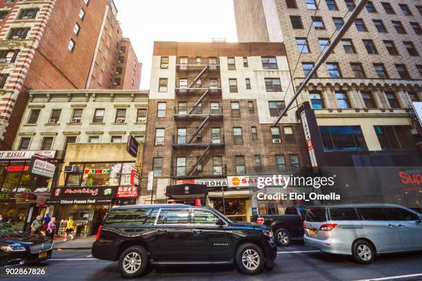 aziatisch restaurant midtown manhattan new york straat flare trappen - sun flare on glass stockfoto's en -beelden