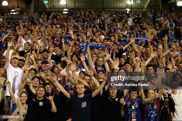 Jets fans celebrate their team during the round 15 A-League match between the Newcastle Jets and the Central Coast Mariners at McDonald Jones Stadium...