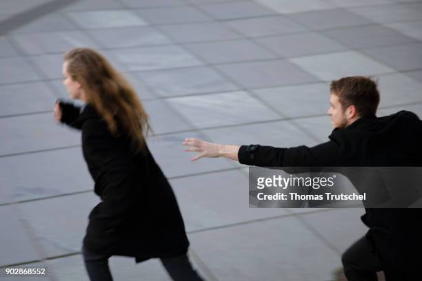 Posed Scene: A woman is being persecuted by a man on January 08, 2018 in Berlin, Germany.