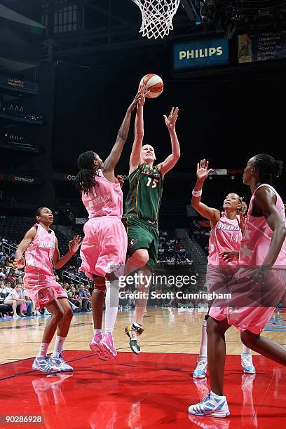 Lauren Jackson of the Seattle Storm lays the ball up against Chamique Holdsclaw of the Atlanta Dream during the WNBA game on August 15, 2009 at...
