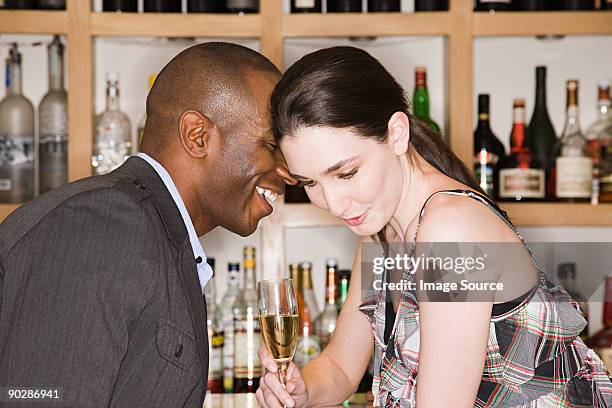 young couple in a bar - wine bar stock pictures, royalty-free photos & images