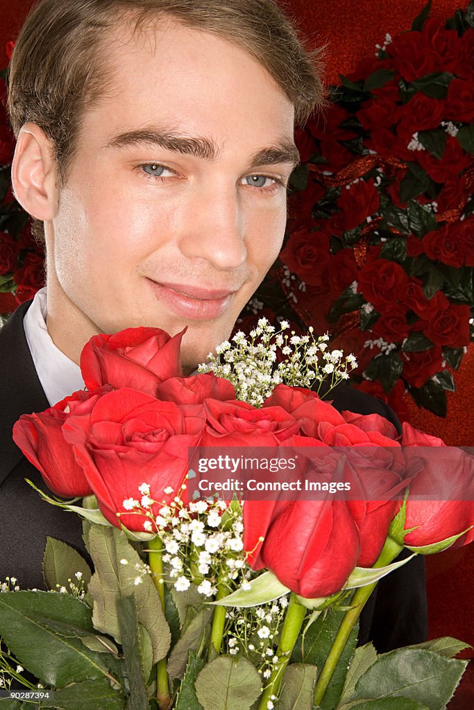 Man Among Roses Romantic Man With A Bunch Of Roses High-Res Stock Photo - Getty Images
