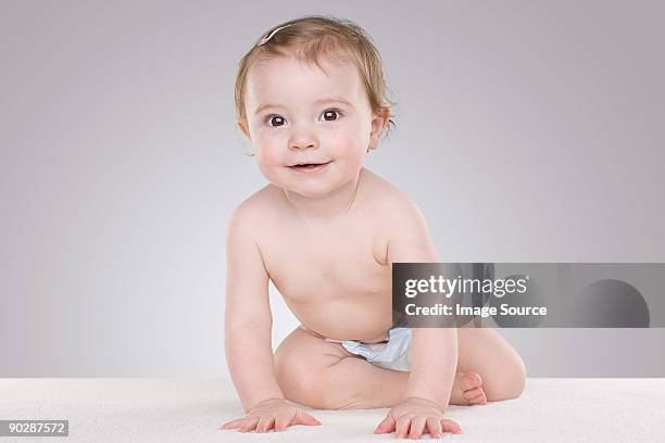 portrait of a baby girl - cute baby studioshot stock-fotos und bilder