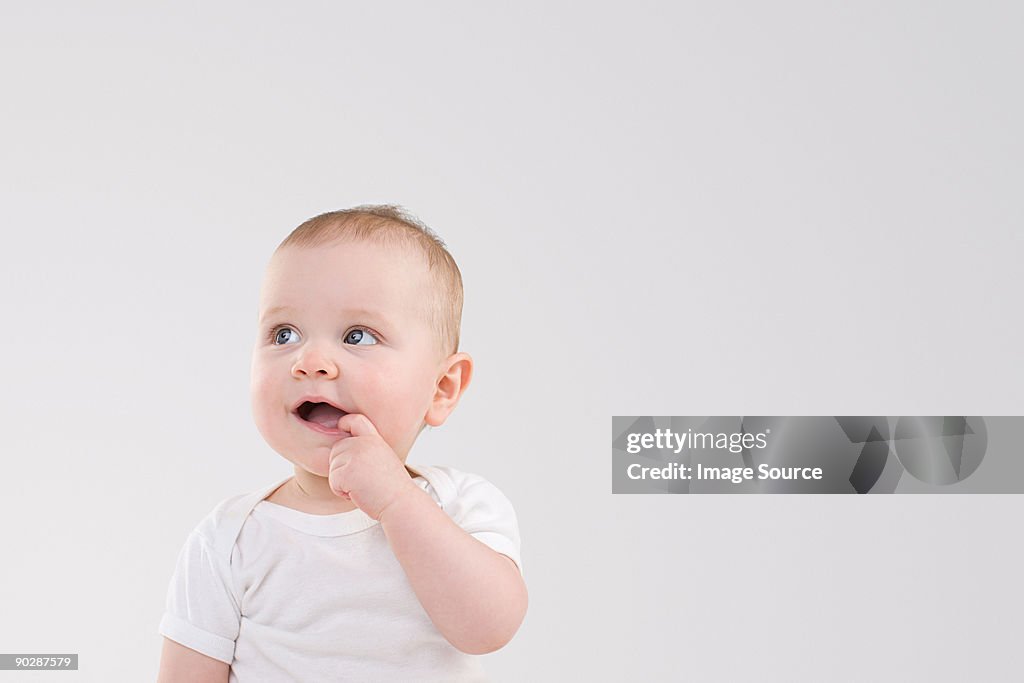 Baby with finger in mouth