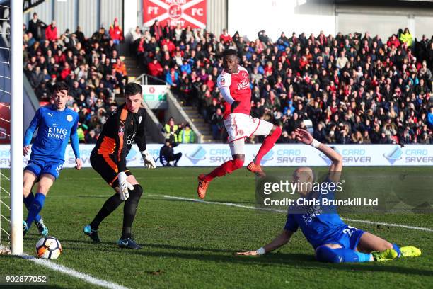 Devante Cole of Fleetwood Town in action with Eldin Jakupovic of Leicester City during The Emirates FA Cup Third Round match between Fleetwood Town...