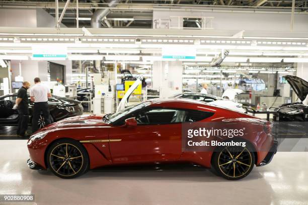 An Aston Martin Vanquish Zagato luxury automobile sits next to the final assembly line at Aston Martin Lagonda Ltd.'s manufacturing and assembly...