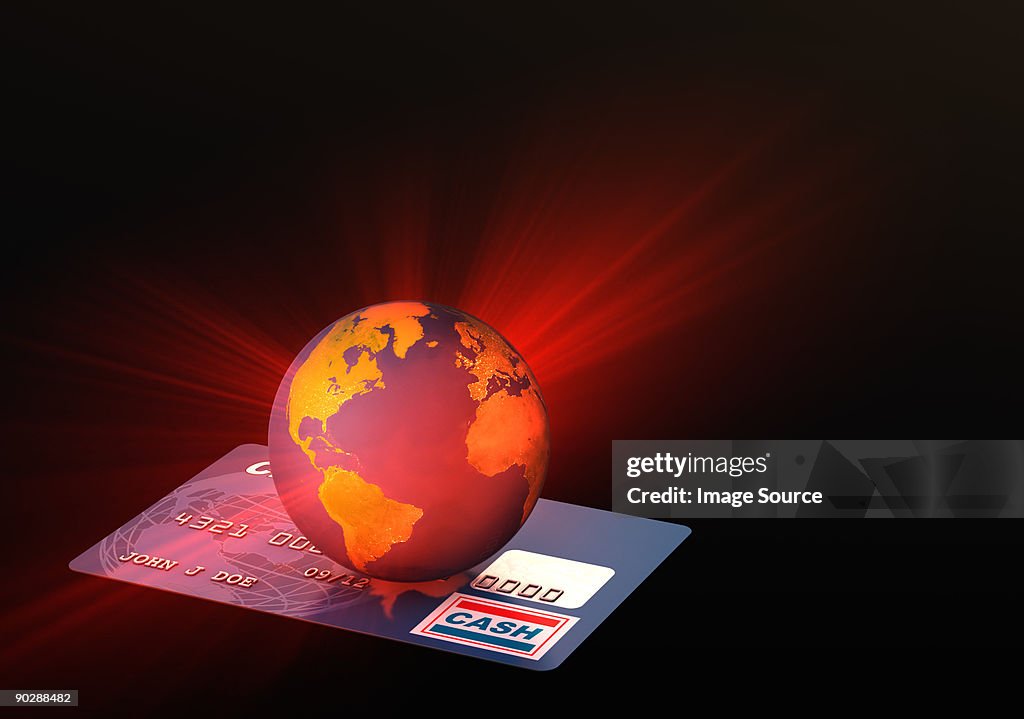 Light coming from globe on credit card