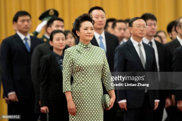 First Lady Peng Liyuan loos on during a welcoming ceremony inside the Great Hall of the People on January 9, 2018 in Beijing, China.