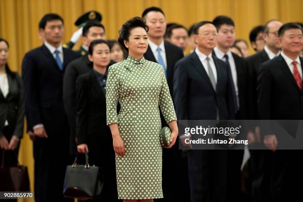 First Lady Peng Liyuan loos on during a welcoming ceremony inside the Great Hall of the People on January 9, 2018 in Beijing, China.