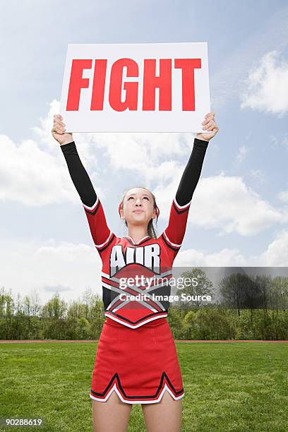 cheerleader with fight sign - edison nova jersey - fotografias e filmes do acervo