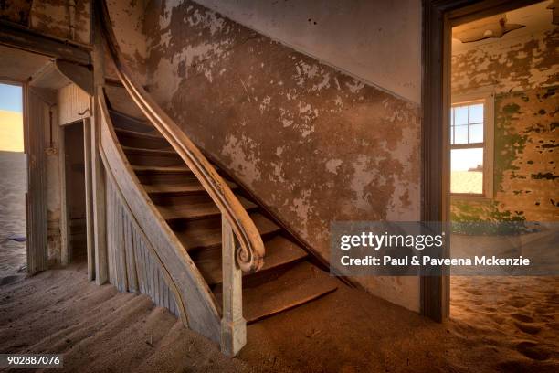 interior of abandoned house in the ghost town of kolmanskop - kolmanskop namibia stock pictures, royalty-free photos & images