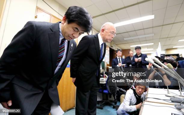 Masanori Narita , President of the Japan Canoe Federation, bows during a press conference on January 9, 2018 in Tokyo, Japan. 32-year-old Yasuhiro...
