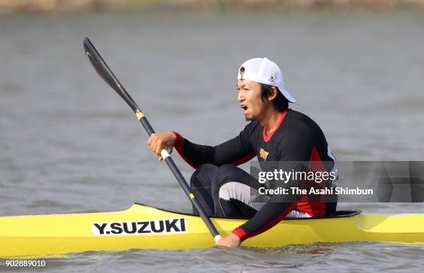 Yasuhiro Suzuki of Japan reacts after competing in the Canoe Sprint Men's Kayak Single 1000m during day thirteen of the Guangzhou Asian Games at the...