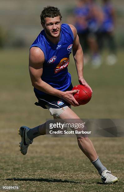 Sam Reid of the Bulldogs looks to kick the ball during the Western Bulldogs AFL training session at Whitten Oval on September 2, 2009 in Melbourne,...