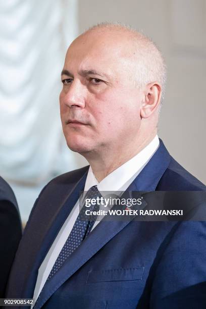 Newly-appointed Polish Minister of Interior and Administration, Joachim Brudzinski, looks on, on January 9, 2018 during a ceremony with Polish...