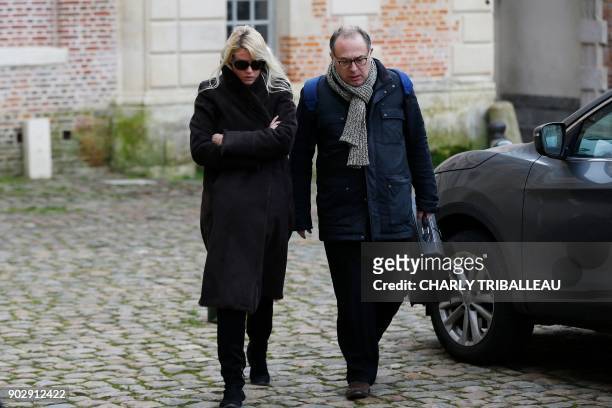 Alice Bertheaume , partner of late French writer Gonzague Saint Bris, arrives with her lawyer at the courthouse in Lisieux, northwestern France, on...