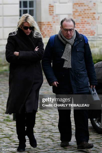 Alice Bertheaume , partner of late French writer Gonzague Saint Bris, arrives with her lawyer at the courthouse in Lisieux, northwestern France, on...