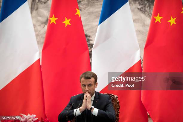 French President Emmanuel Macron during a joint press briefing with Chinese President Xi Jinping at the Great Hall of the People on January 9, 2018...
