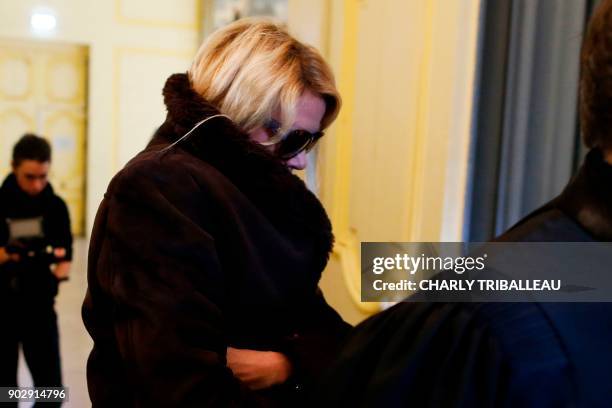 Alice Bertheaume, partner of late French writer Gonzague Saint Bris, arrives at the courthouse in Lisieux, northwestern France, on January 9, 2018 to...