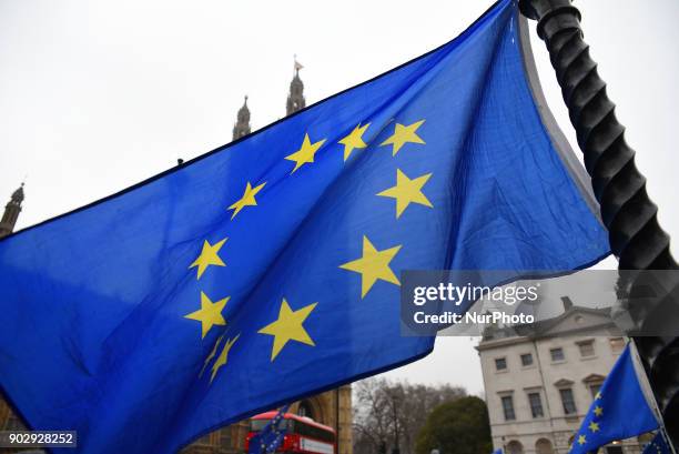 European Union and British flags are waved and exposed outside the Parliament, London on January 9, 2018. Brussels accuses David Davis of hypocrisy...