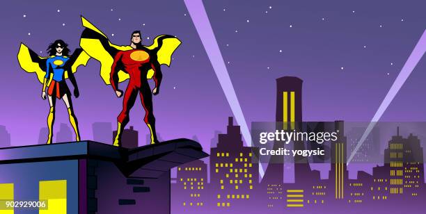 vector superhero couple in the city at night - searchlight stock illustrations