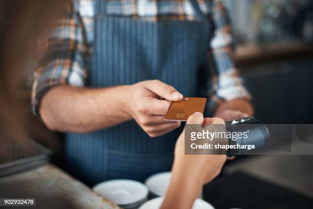 electronically payed - customers pay with contactless cards imagens e fotografias de stock