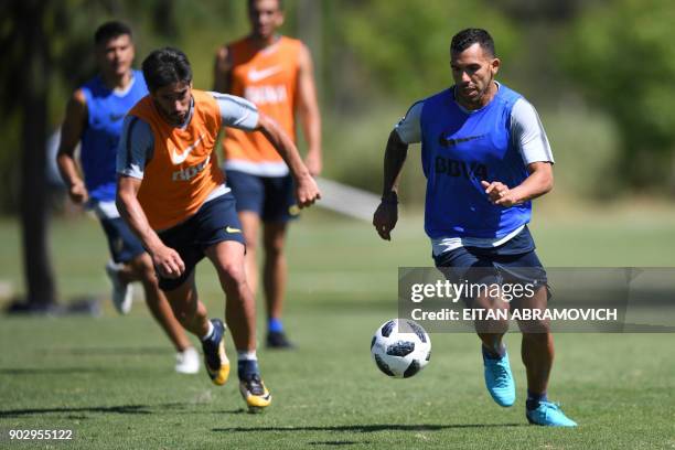 Argentine footballer Carlos Tevez takes part in a training session at Los Cardales, Buenos Aires province, on January 9, 2018. Former Manchester...