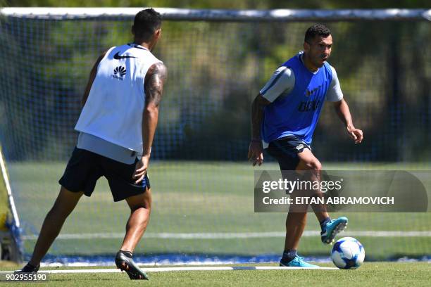 Argentine footballer Carlos Tevez takes part in a training session at Los Cardales, Buenos Aires province, on January 9, 2018. Former Manchester...