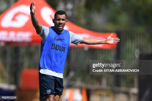 Argentine footballer Carlos Tevez takes part in a training session at Los Cardales, Buenos Aires province, on January 9, 2018. Former Manchester...