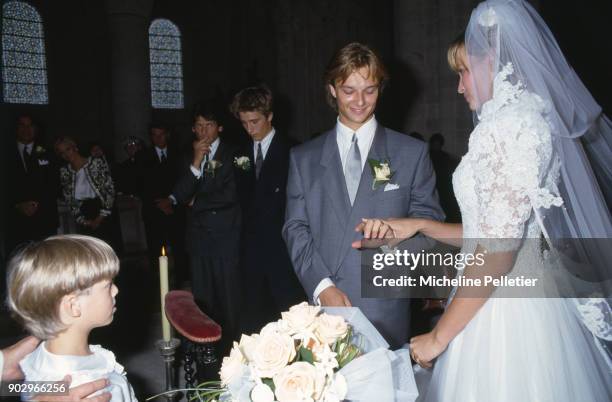 David Hallyday and Estelle Lefebure at the church on their wedding day, Saint Martin de Boscherville, France, 15th September 1989