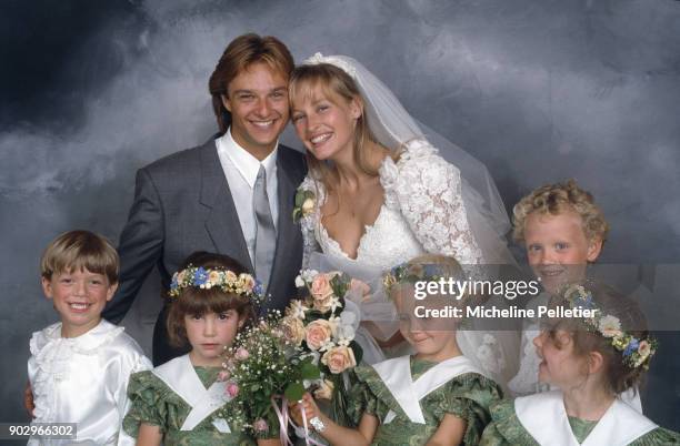 David Hallyday and Estelle Lefebure posing on their wedding day, Saint Martin de Boscherville, France, 15th September 1989