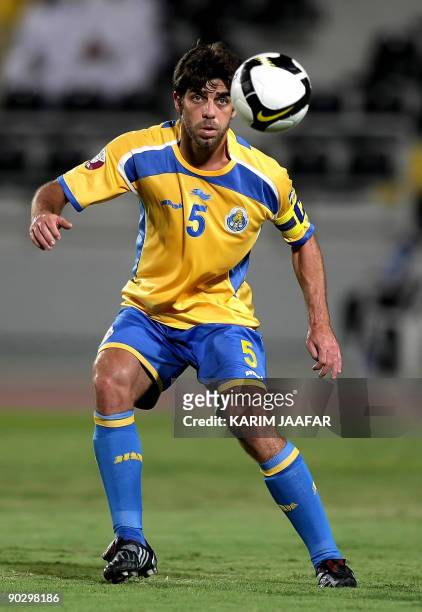 Al-Gharrafa's Brazilian midfielder Juninho eyes the ball during his team's Sheikh Jassem Cup semi-final football match against Umm Salal in Doha late...