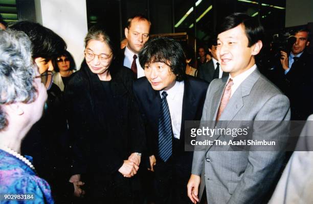 Japanese Crown Prince Naruhito and conductor Seiji Ozawa talk at the Royal Festival Hall on September 16, 1991 in London, England.
