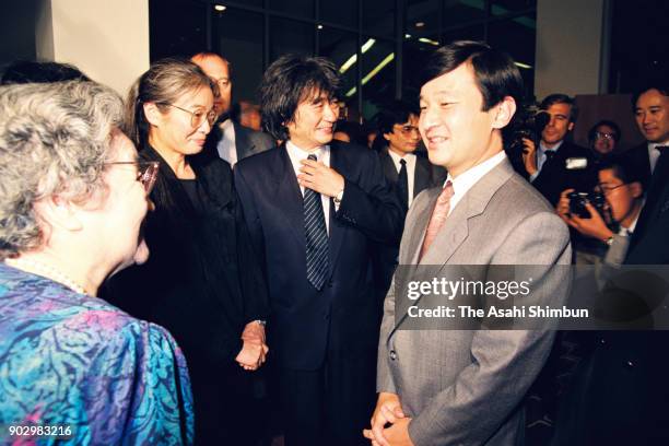 Japanese Crown Prince Naruhito and conductor Seiji Ozawa talk at the Royal Festival Hall on September 16, 1991 in London, England.