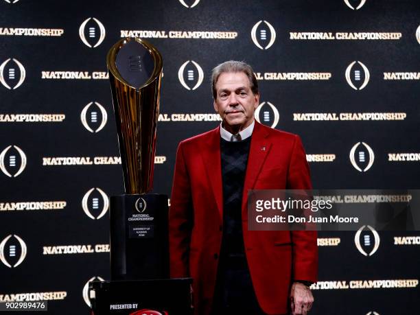 Head Coach Nick Saban of the Alabama Crimson Tide poses with the National Championship Trophy presented by Dr. Pepper during the College Football...