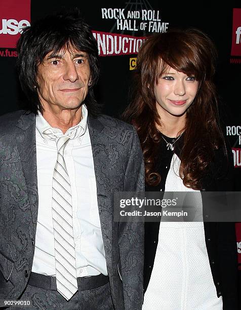 Musician Ron Wood of the Rolling Stones and Ekaterina Ivanova attend the 24th Annual Rock and Roll Hall of Fame Induction Ceremony at Public Hall on...